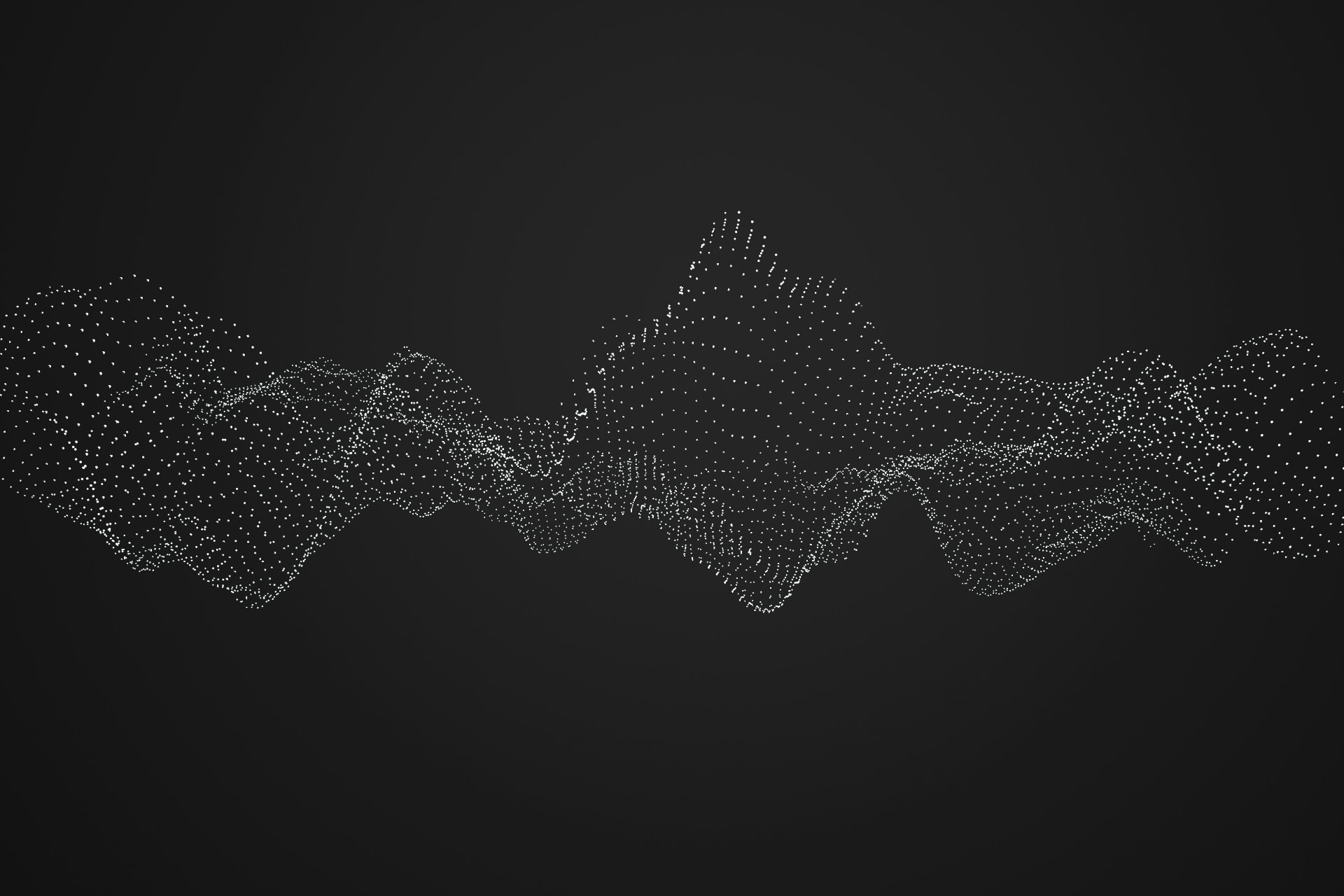 White particles forming flowing waves across a black background
